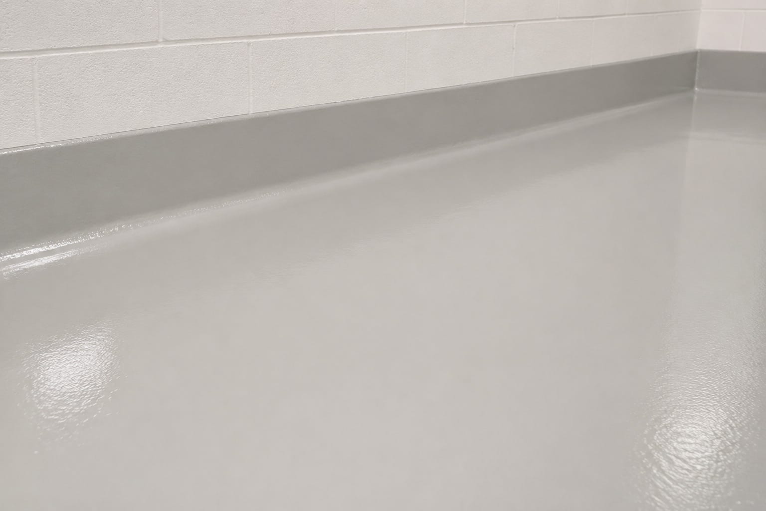 Product #2 chemical resistant epoxy floor coating with an integral cove base